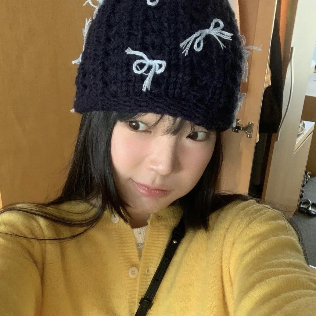 

Autumn and winter crimped bow knitted bag head fashionable cold hat women s trendy new wool hat warm and sweet Adult elastic (56-58cm) бежевий