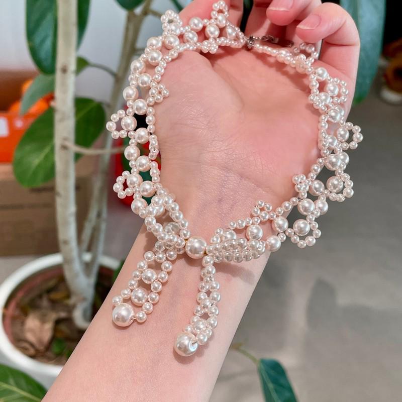 Handmade Pearl Necklace with Bow Clavicle Chain - Light Luxury Design for Women