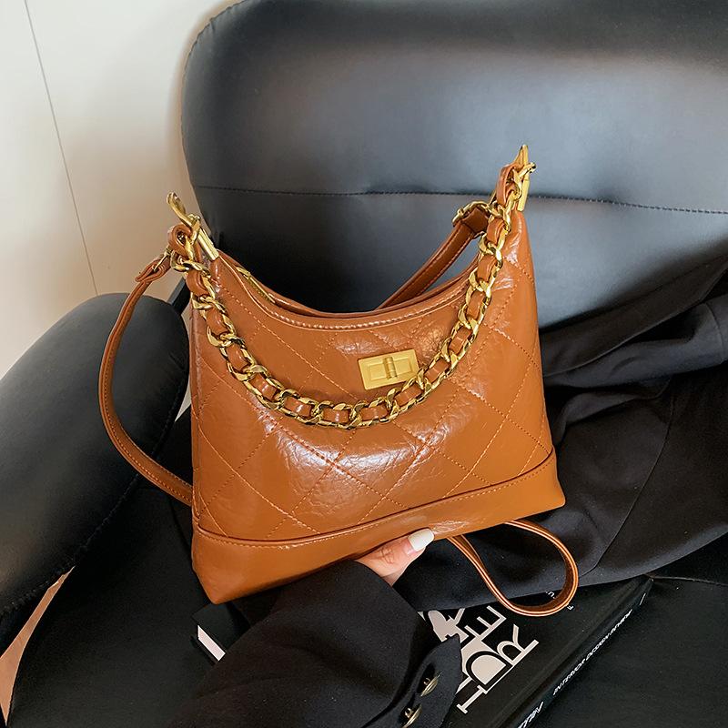 Nischendesign Tasche Damen neue vielseitige Retro Umhängetasche Diamantkette einzelne Schulter Knödeltasche