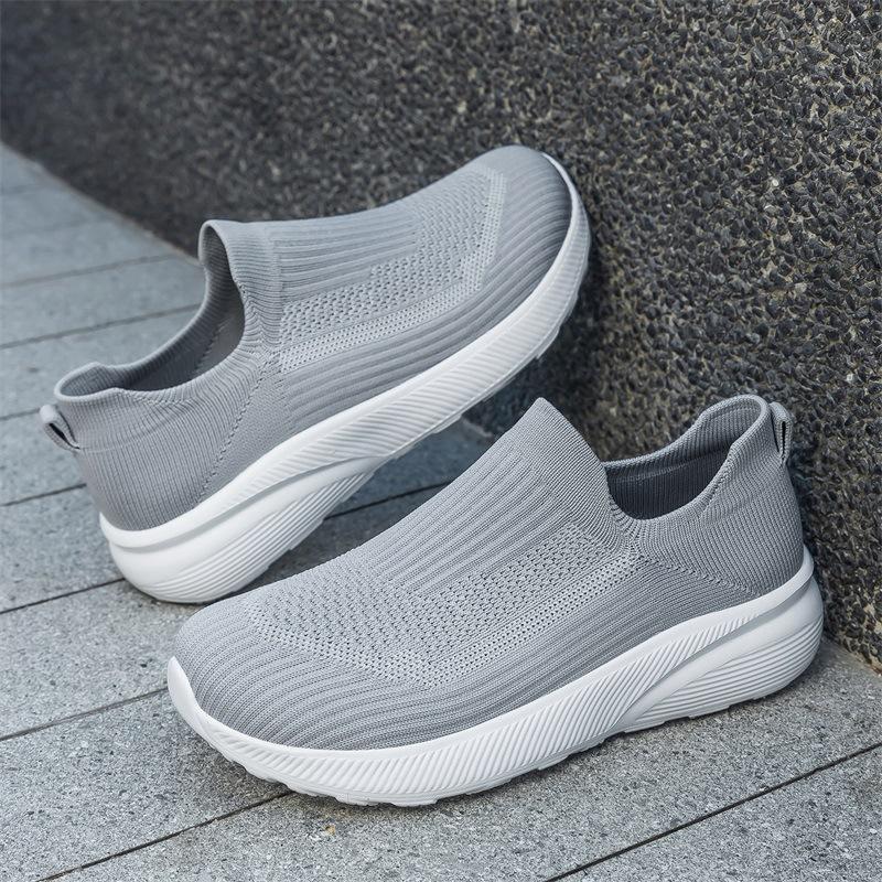 Spring new wide sole breathable cloth shoes large size sports and leisure shoes flying woven shoes lazy shoes