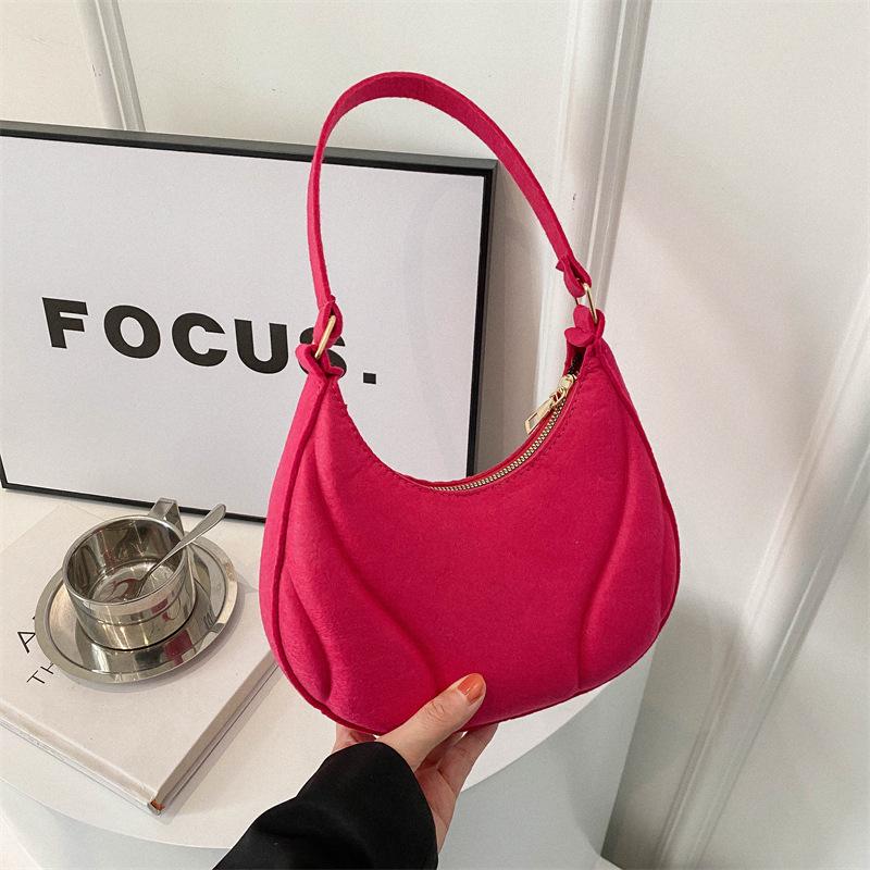 This Year's Trendy Women's Minimalist Dumpling Bag - a New Korean-style Shoulder Bag with Niche Fashion and Elegant Underarm Design.