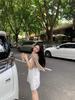 Women's Stylish V-Neck Sleeveless Summer Dress: Loose Fit, Slimming, Solid Color, Short Skirt - New Fashion Collection.