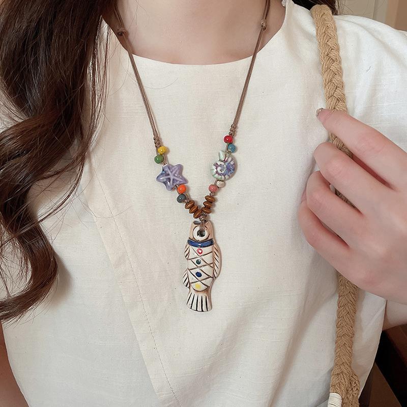 Ethnic Style Y-Shaped Ceramic Fish Necklace for Women Wooden Rope Handmade Bead Tassel Charm Bohemian Style Exquisite Accessory