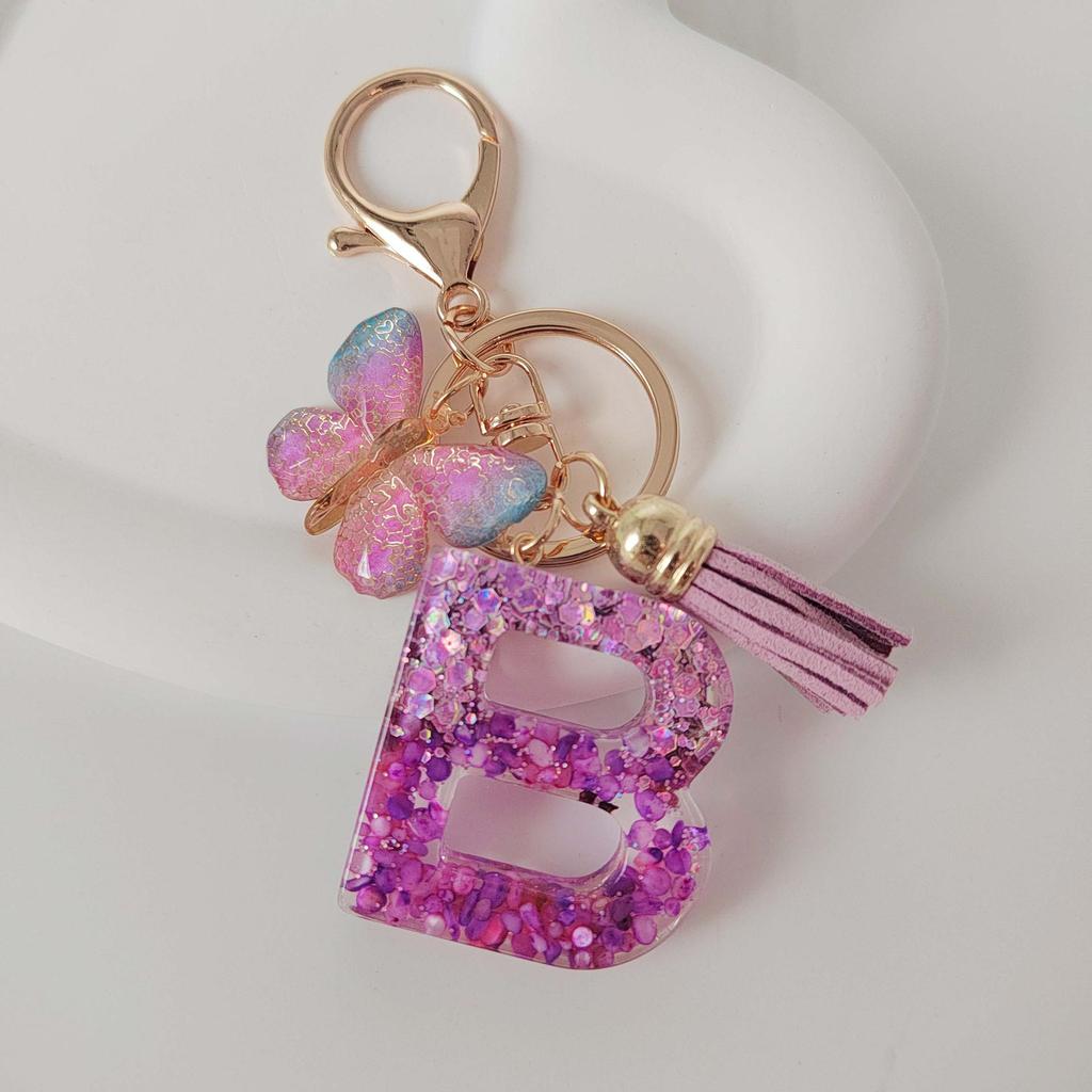 Purple Iridescent Resin Letter Keychain with Butterfly Tassel