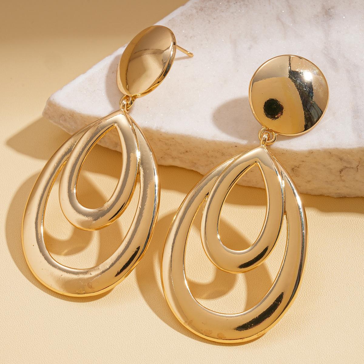 Metal-sensitive glossy geometric hollow water drop silver needle earrings simple earrings