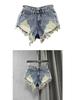 Vintage Low Rise Denim Shorts with Fringe & Ripped Pockets