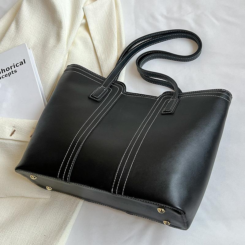 Skulderveske med stor kapasitet og ny stilig tekstur, allsidig pendler-veske for vår og sommer