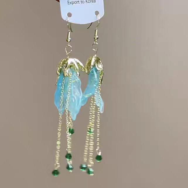 Элегантные серьги-капли с жемчугом - Мода 2025 для круглых лиц