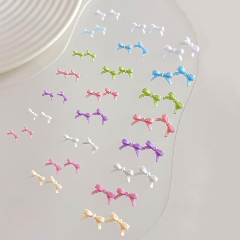 50Pcs Colorful Bow Nail Art Parts Charms Bulk Shiny Mini Resin Ribbon Nail Rhinestones Diy Summer Nail Art Decor Accessories
