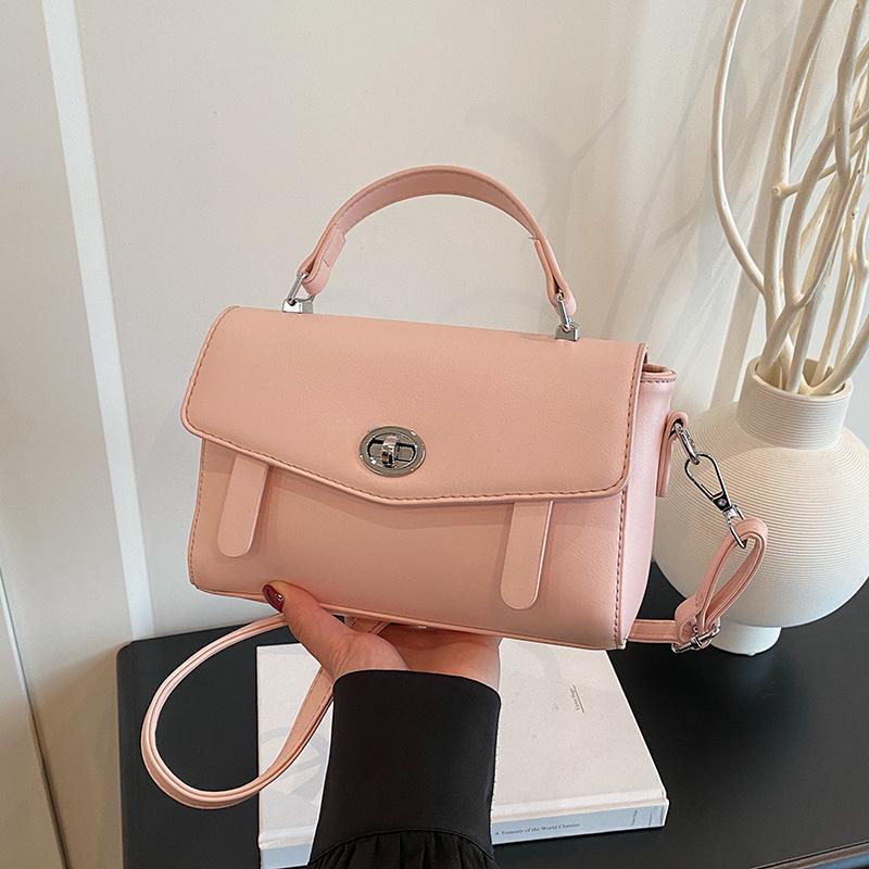 Summer new fashionable solid color lock flip bag versatile portable shoulder oblique span women's bag