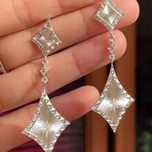 Cold silver rhombus earrings women s niche high-end stud earrings retro temperament showing small face earrings