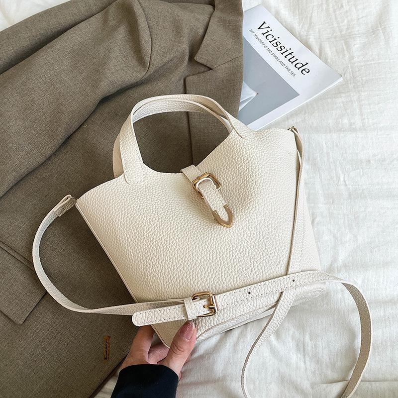 Spring and summer new fashion portable bucket tote bag simple atmosphere shoulder messenger bag casual versatile commute
