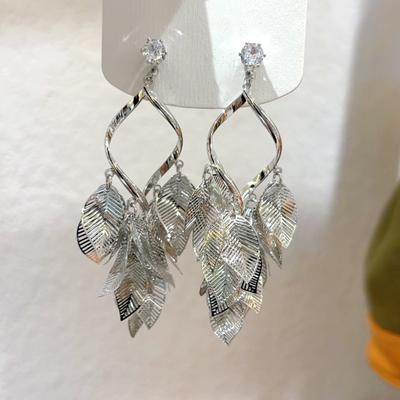 Boucles d'oreilles zircon feuille creuse à franges boucles d'oreilles personnalisées niche exagérée boucles d'oreilles vent froid femmes