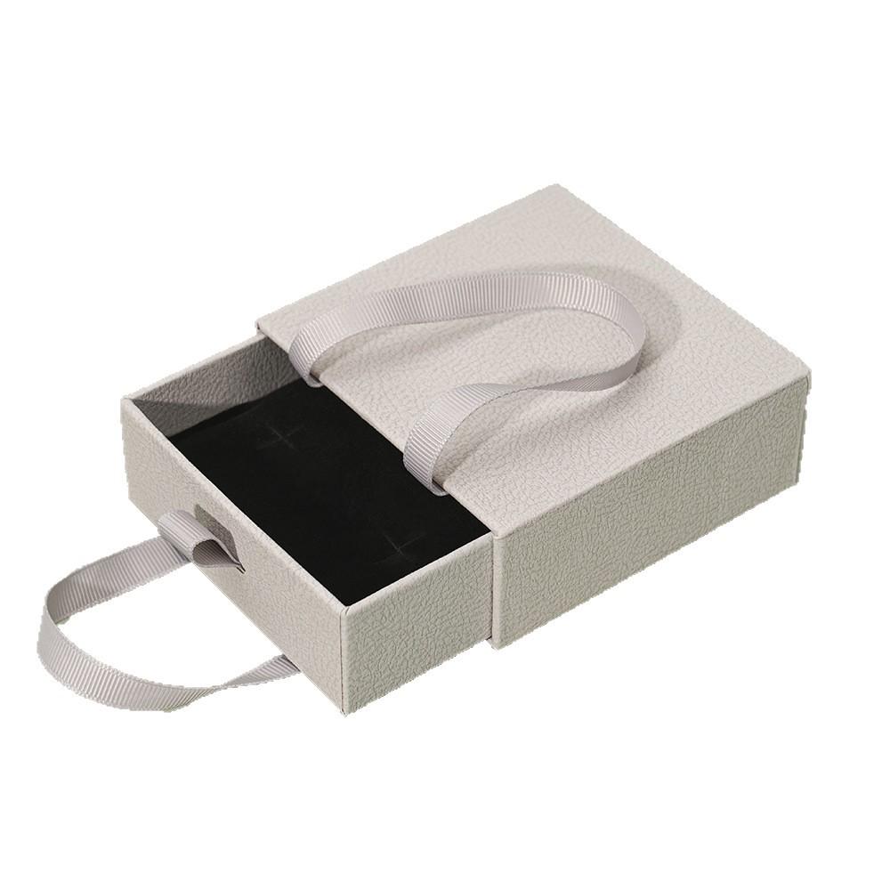 Compact Portable Jewelry Box for Rings, Necklaces, and Ear Studs - Simple Design, Ready for Gift-Giving.