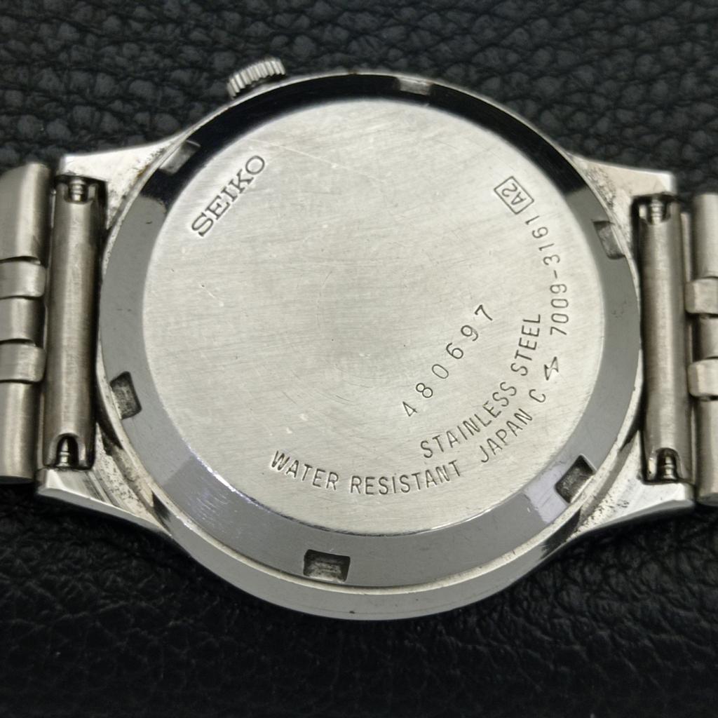 GENUINE VINTAGE SEIKO AUTOMATIC 7009A JAPAN MENS GREEN DIAL WATCH a701682-5 R206c-a701682
