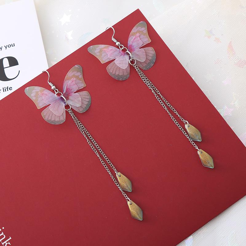 Purple Tassel Butterfly Pearl Earrings: Bold and Elegant Design