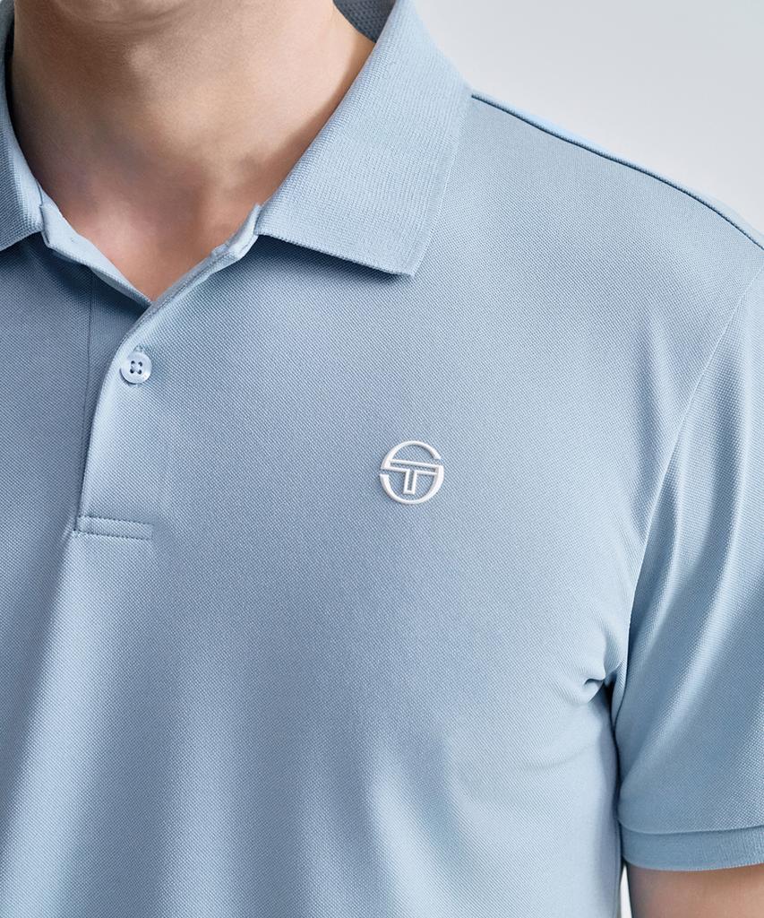 SERGIO TACCHINI M Playing Polo