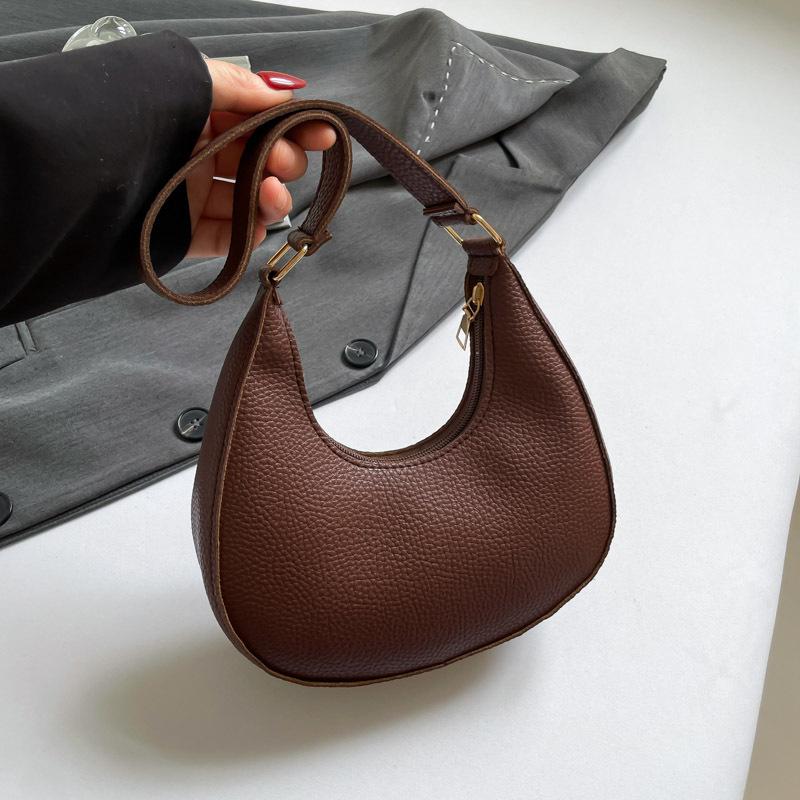 

Simple crescent moon bag solid color temperament underarm women s bag 2025 new Korean version lychee pattern fashion shoulder messenger bag