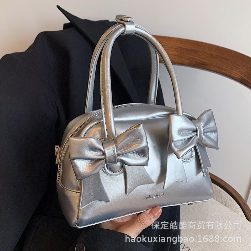 Niche simple bow handbag small bag women's texture pillow bag 2025 new fashion versatile messenger bag