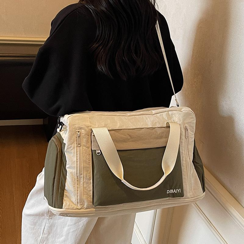 Fashion travel bag, large capacity, women's portable and light business trip duffel bag, men's expanded messenger sports storage fitness bag