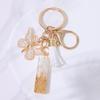 Chic White Tassel Letter Keychain with Resin Epoxy Pendant - Stylish Ornament for Bags