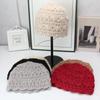 Handmade crochet knitted hat women's autumn and winter hollow flower bag head hat literary and retro wool hat double-layer casual cold hat