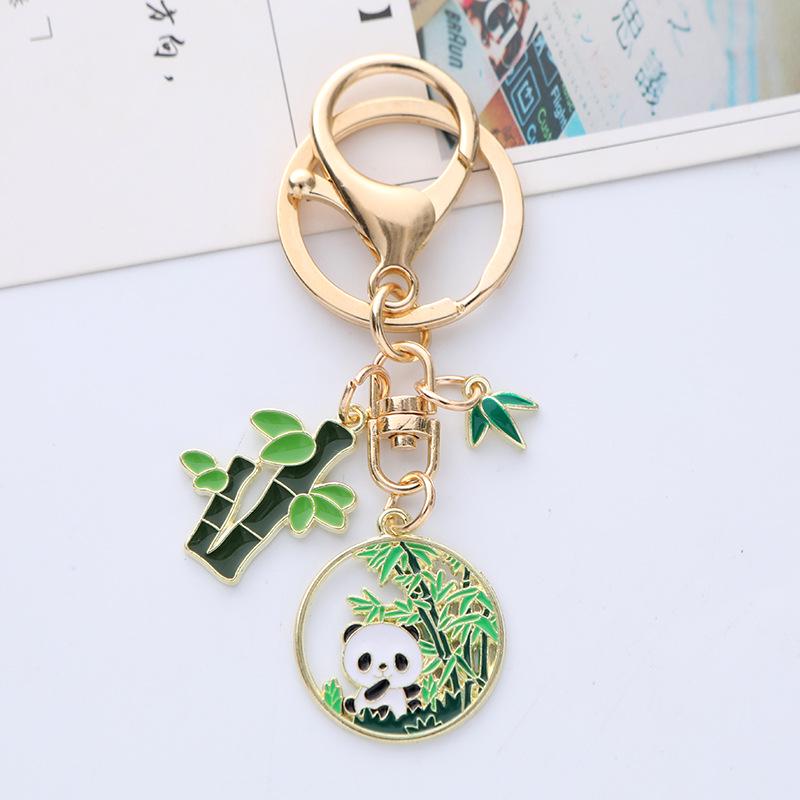 Quirky Cartoon Panda Alloy Keychain Pendant with Cute Bamboo Leaf Design - Earphone Case & Bag Decoration