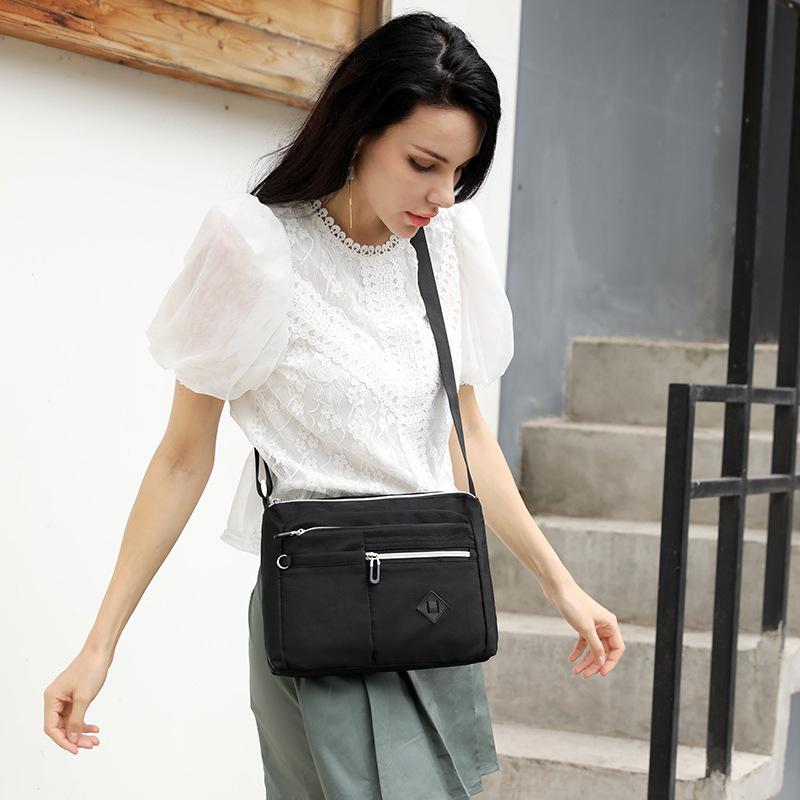 

2025 new stylish and simple shoulder messenger bag, women s large-capacity versatile anti-splashing backpack фиолетовый