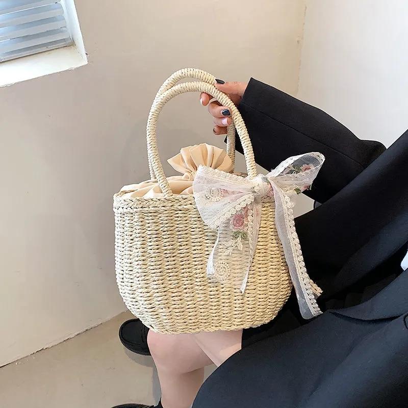 

Новая летняя кружевная соломенная сумка, женская большая вместительная пляжная сумка из ротанга, дорожная сумка для отдыха, сумка-ведро ручной работы, сумка-тоут 27*10*19cm белый/бежевый