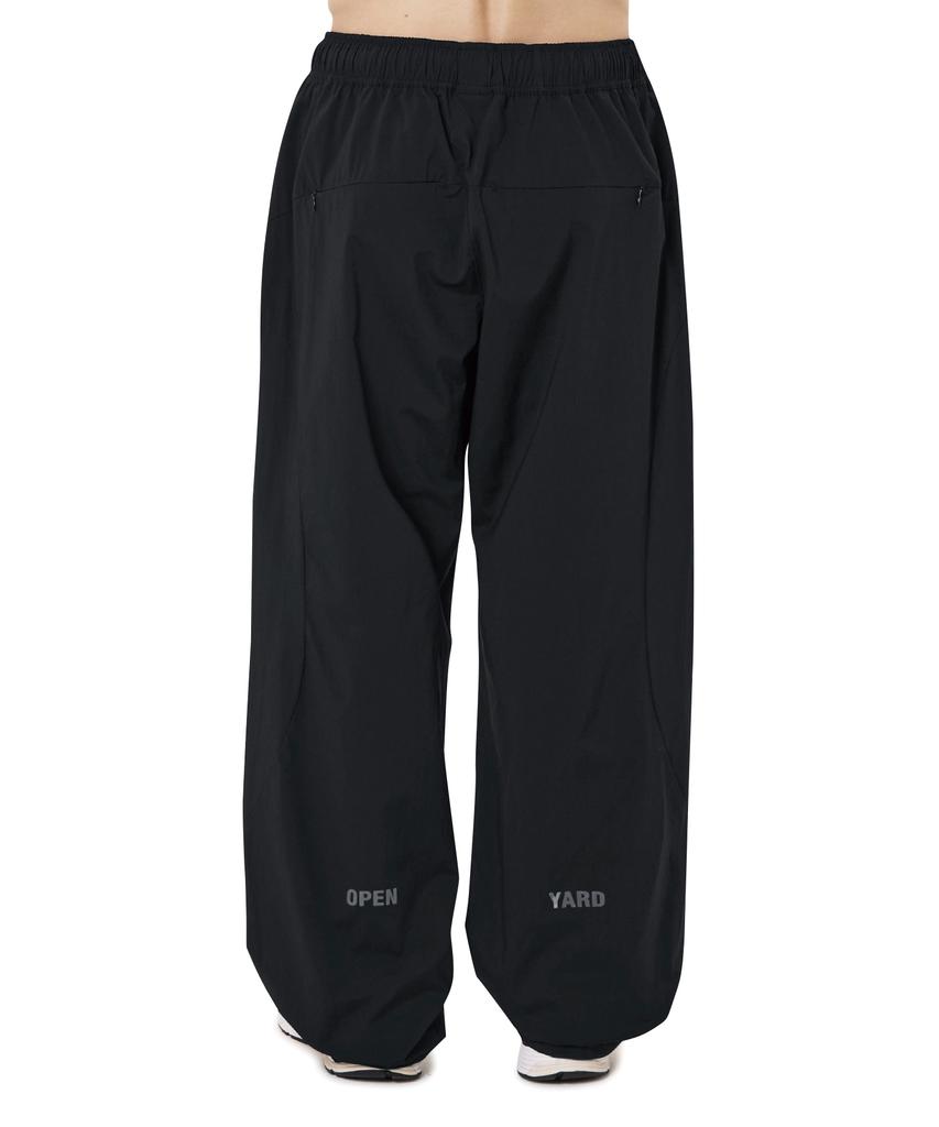 OHY Side Circular Zip High Nylon Pants - Black