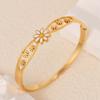 Titanium steel new craftsmanship hollow small daisy oil drip bracelet spring buckle gold and silver small fresh and versatile jewelry