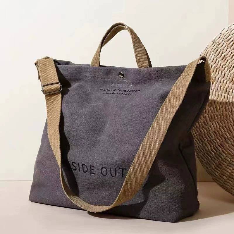 Borsa a tracolla in tela da uomo con grande capacità e design a lettere per l'uso quotidiano