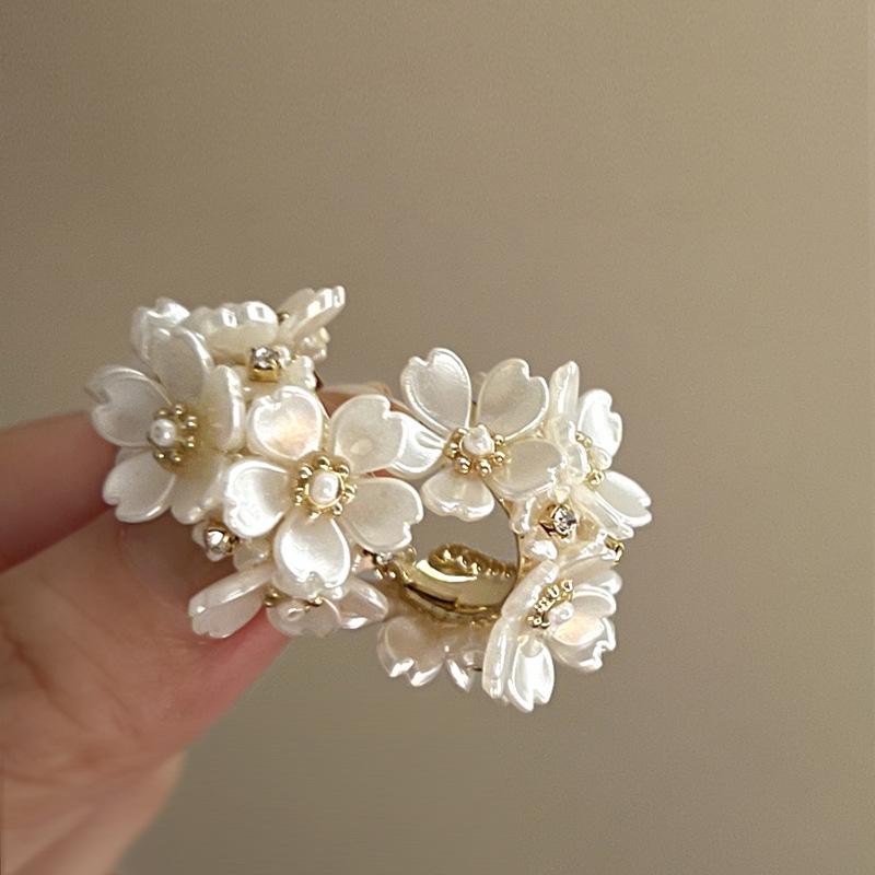 Silver Needle White Heart Tassel Earrings: Luxurious, Versatile, and Stylish Stud Earrings for Women.