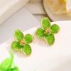 Soft Pink Enamel Flower Stud Earrings with Gold Tone Accents for Women Elegant Style