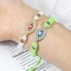 Cross-Border Alloy Bamboo Evil Eye Bracelet: Starry Eyed Woven Couple Bow Design