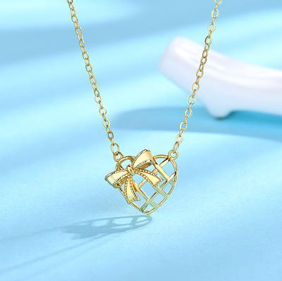 Golden Bow Hollowed-out Love Necklace for Women In Summer Temperament Simple Japanese and Korean Collarbone Chain