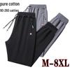Men's Plus Size Cotton Elastic Waistband Sweatpants - Straight Leg with Pockets and Zipper, Comfortable for Running and Casual Wear.