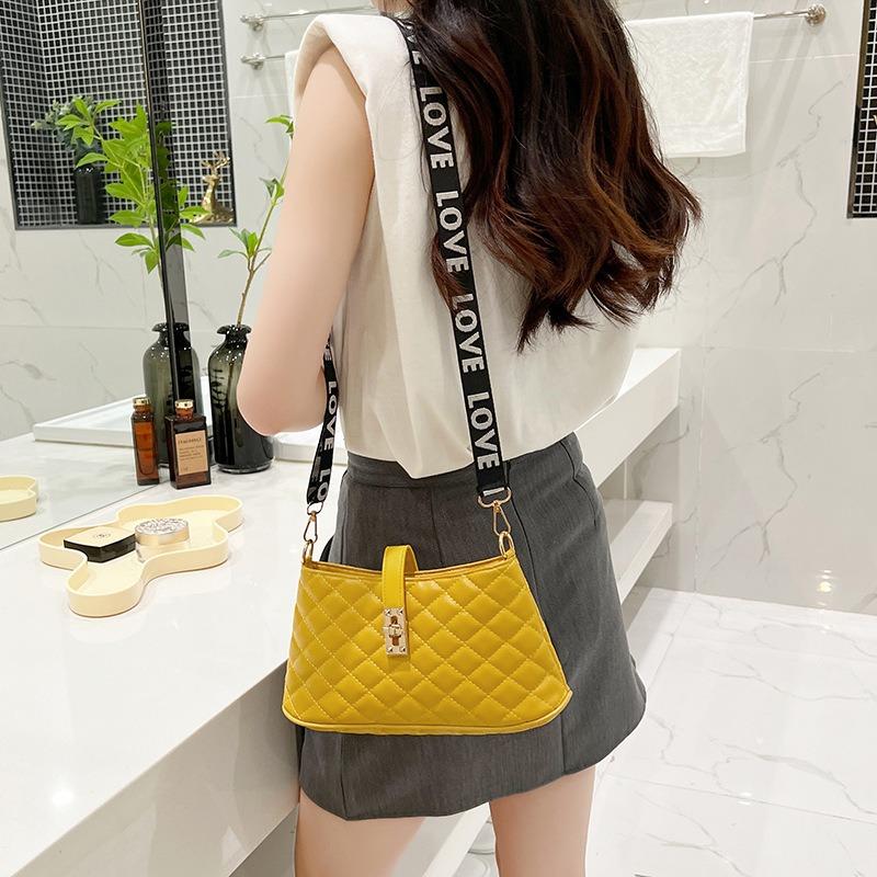 Embroidered rhombus buckle shoulder messenger women's bag, a new versatile light luxury Kelly bag
