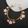 Cute Pink Enamel Flower Bag Chain Charm Gold Metal Handbag Decor Strap Clip On Floral Pendant Ornament For Women Gift