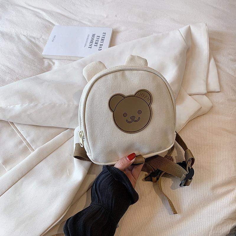 Korean bear kindergarten backpack lightweight weight weight reduction cute boys and girls children's canvas mini backpack