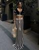Trendy European-American Women's Sexy V-Neck Striped Knit Long Dress Set