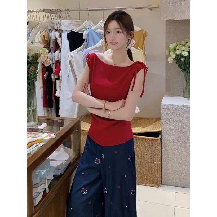 

Новый дизайн женской футболки с открытыми плечами и короткими рукавами, с косой бретелькой и облегающим коротким топом. one size