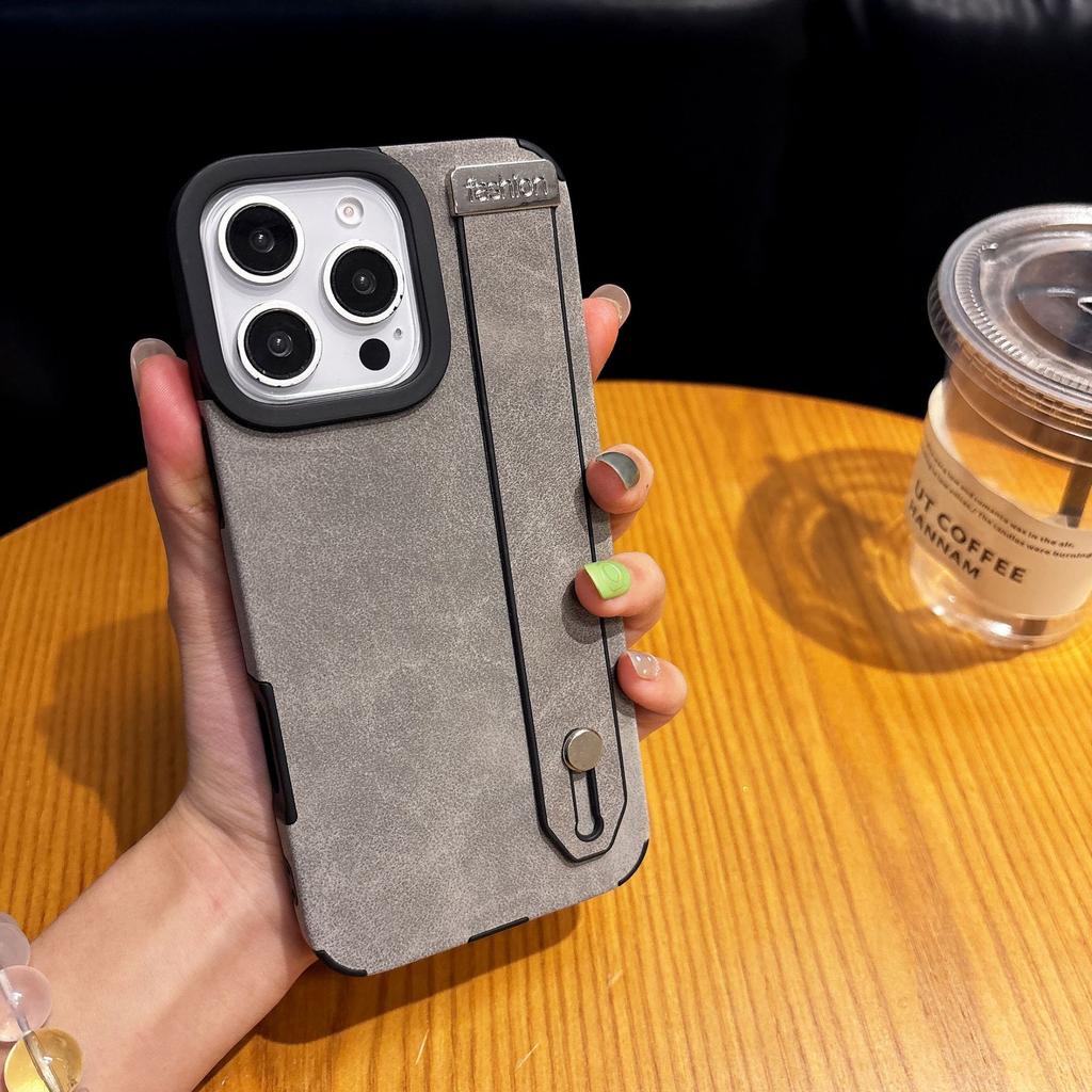 The Suede Leather Is Suitable for The Apple 16promax Phone Case. The IPhone15 Has A Built-in Magnetic 14 Wristband Stand