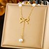 Elegant Golden Pearl Bow Stud Earrings with Chain Tassel Necklace Jewelry Set
