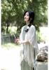 Artistic Tassel Knit Qipao Cardigan Cloak: Versatile Solid Color Shawl Women’s Coat