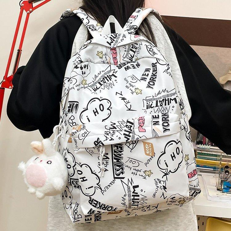 Schoolbag high-value printed graffiti schoolbag female junior high school student large-capacity backpack ins trendy brand high school student 