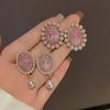 2023 Elegant French Retro Pearl Earrings: Exquisite Round Plate Design