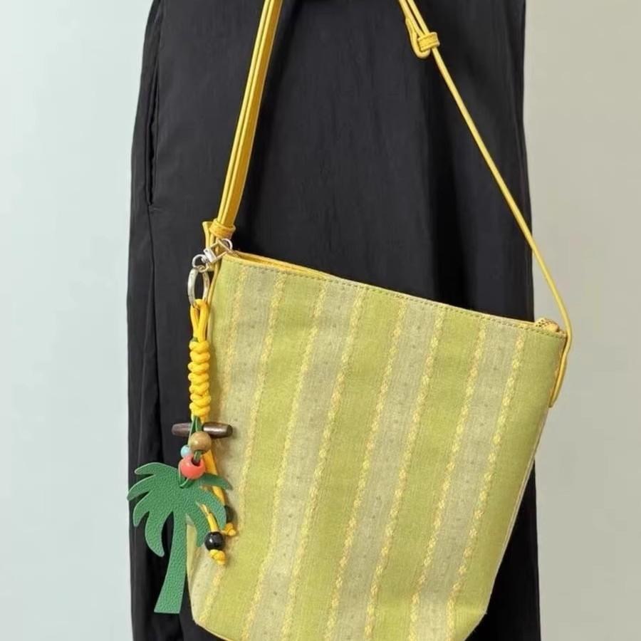 New high-end shoulder armpit bag casual versatile portable bucket bag retro loose canvas bag women