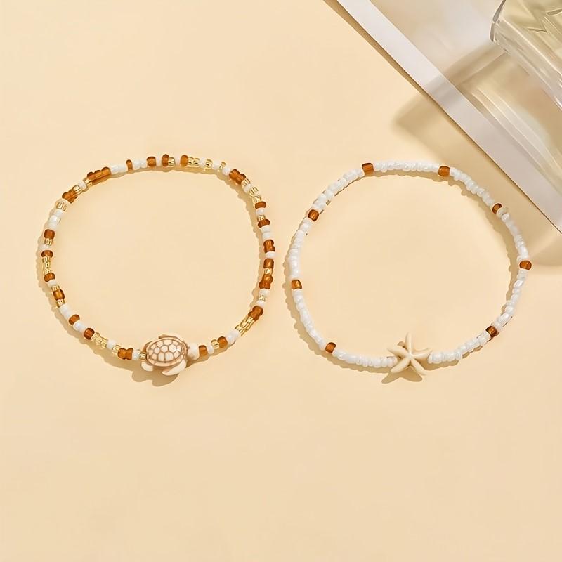 2 Stück Braune Seestern- und Schildkröten-Designs Anhänger Fußkettchen für Damen Sommer Ozean-Thema Fußschmuck Ideal für Strandurlaube