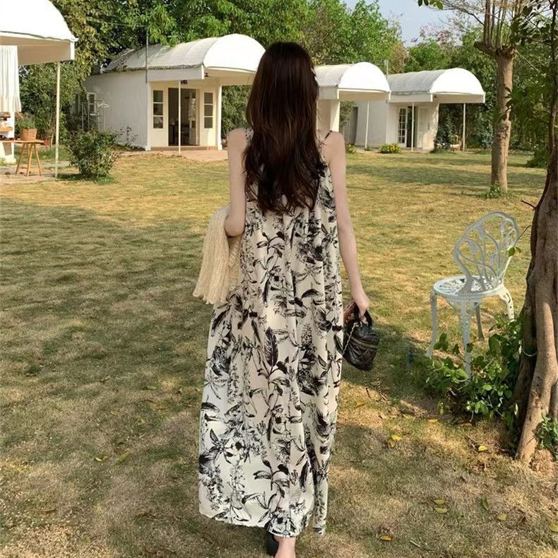 Coffee break French suspender dress children's summer new seaside vacation temperament high-end floral dress